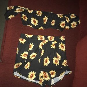 A two piece off shoulder top and flutter shorts
